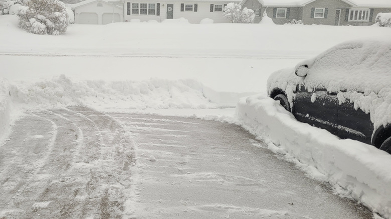 a driveway covered in snow